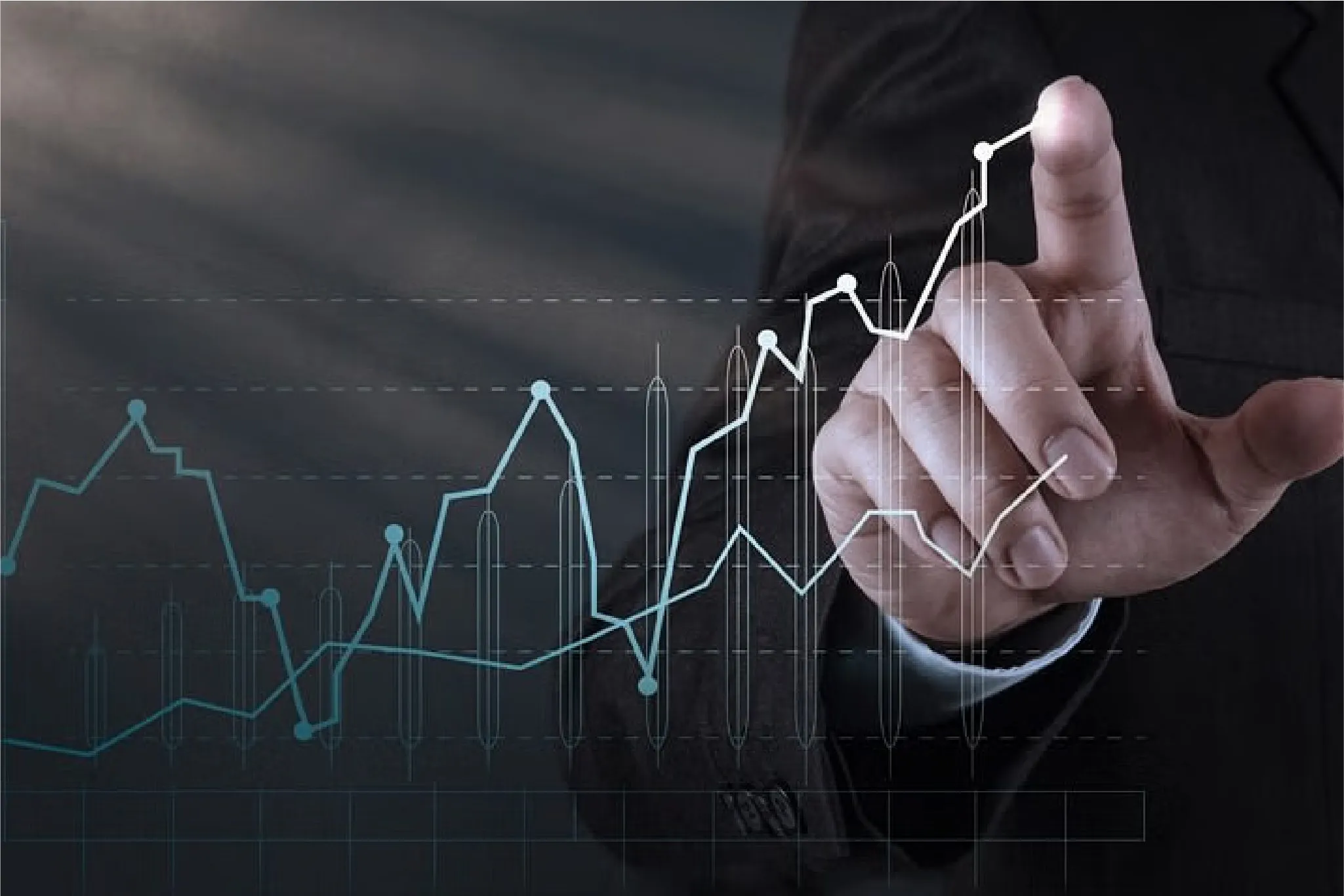 Businessman analyzing rising data analytics graph on virtual screen.