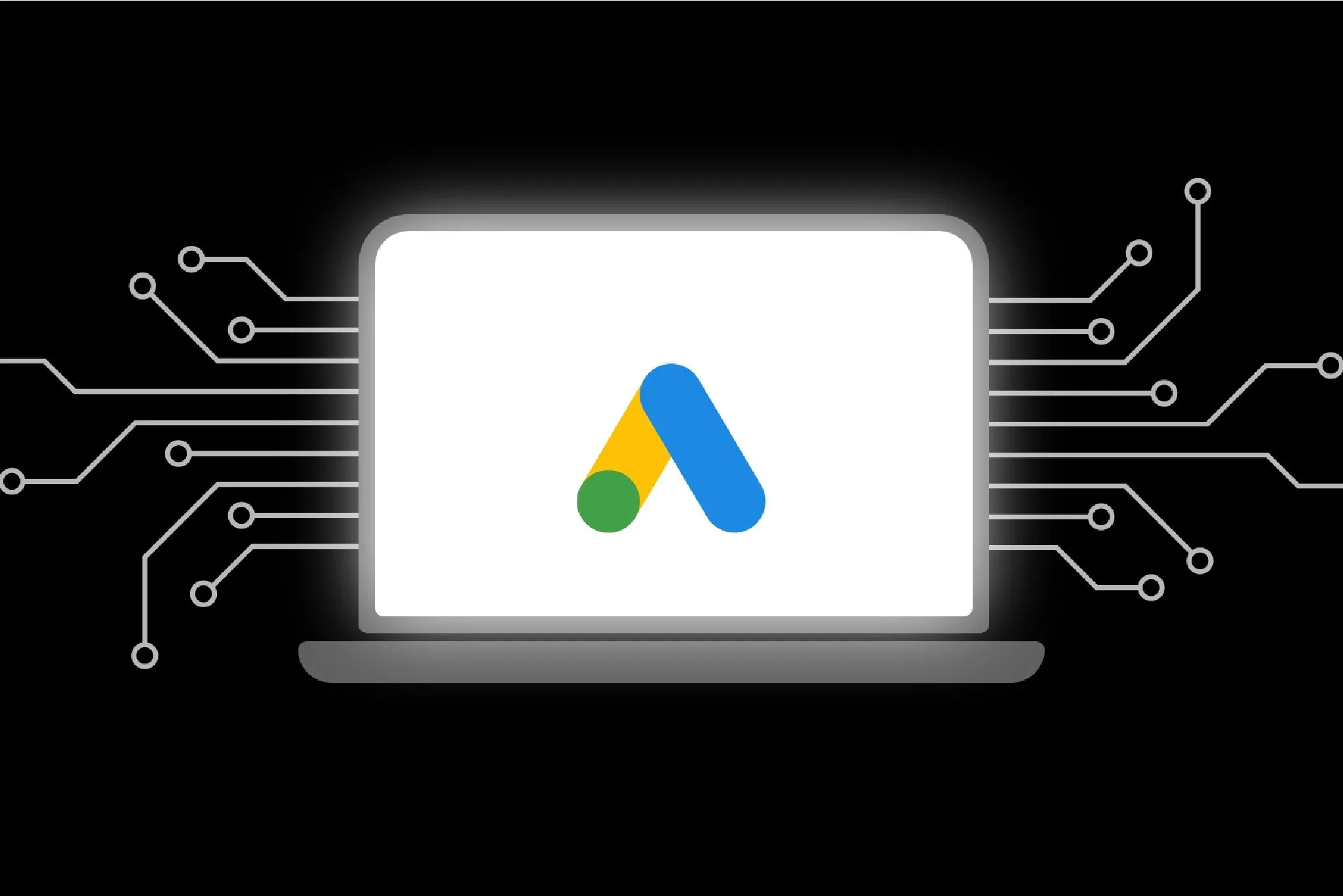 Google Ads logo displayed on a laptop screen with digital circuit lines on a black background.